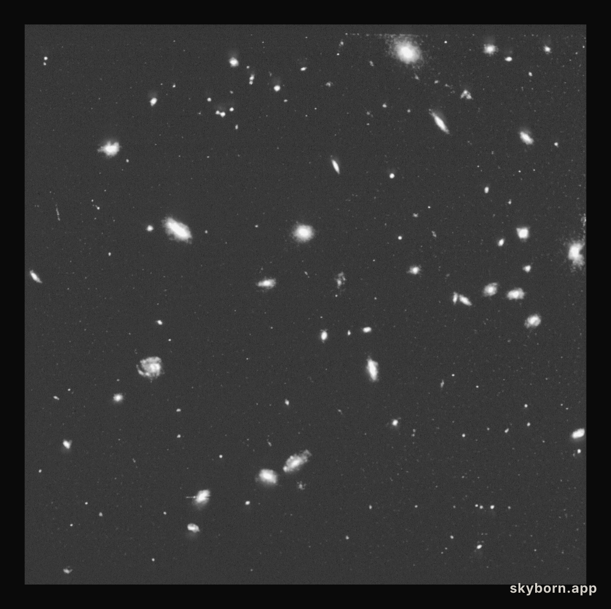 HST photographs a cluster of galaxies four billion light-years away