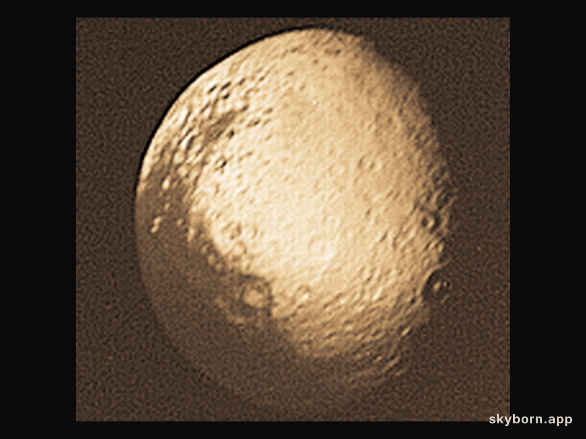 Iapetus: Saturn's Disappearing Moon