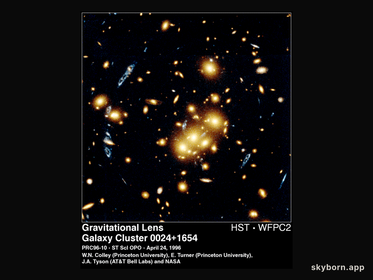Giant Cluster Bends, Breaks Galaxy Images
Credit:
