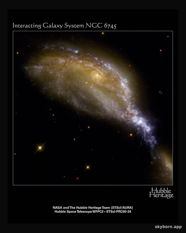 A Galaxy Collision in NGC 6745