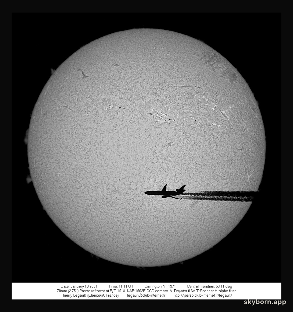 An Airplane in Front of the Sun