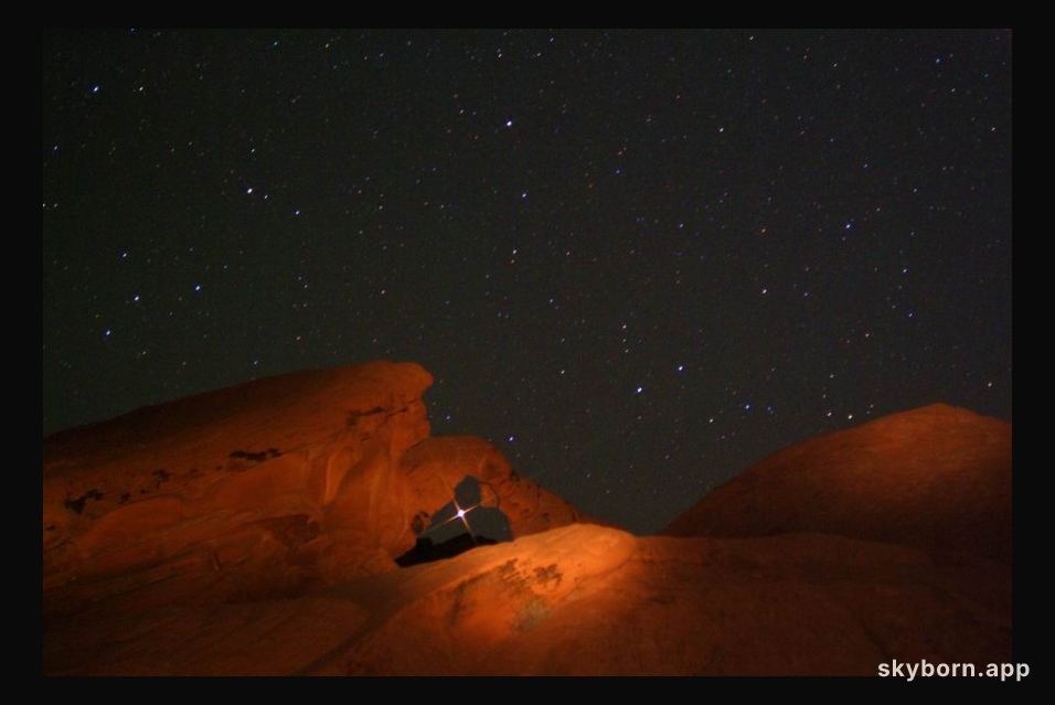 Mars Rising Through Arch Rock