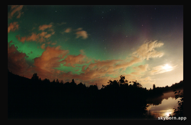 Aurora Over Clouds
