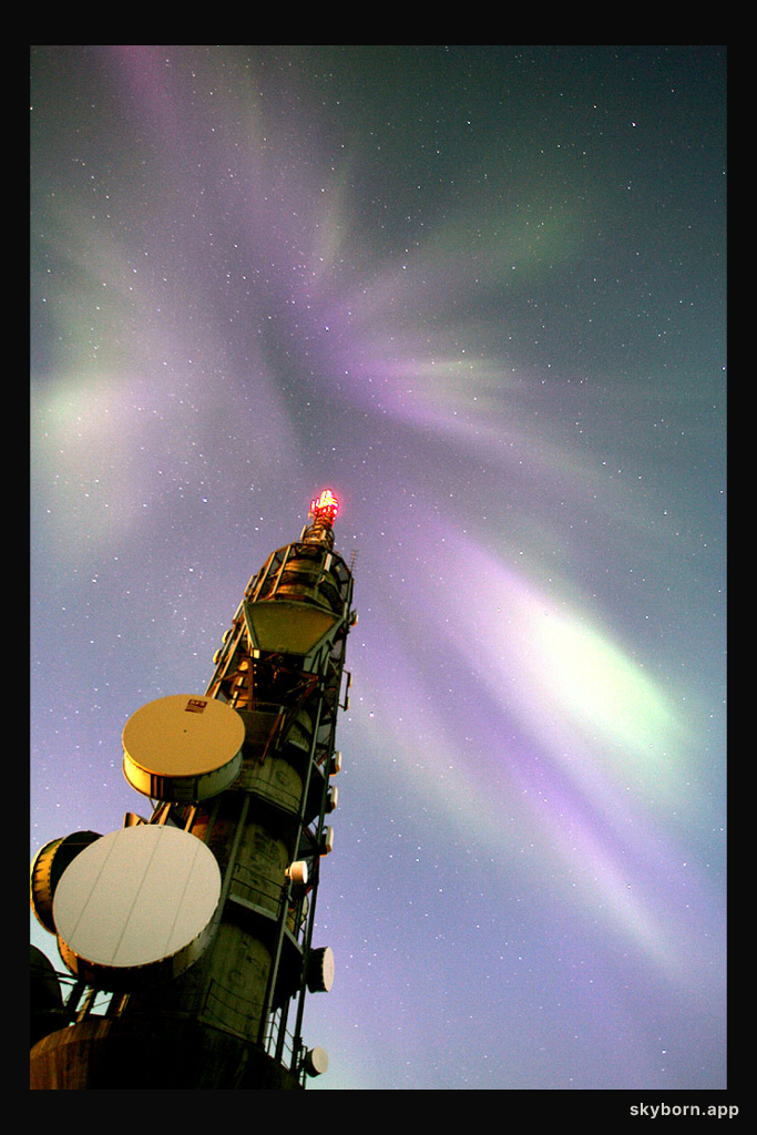 Aurora Over a Communications Tower