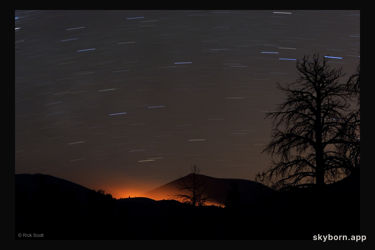 Fire Glow and Star Trails at Sunset Crater