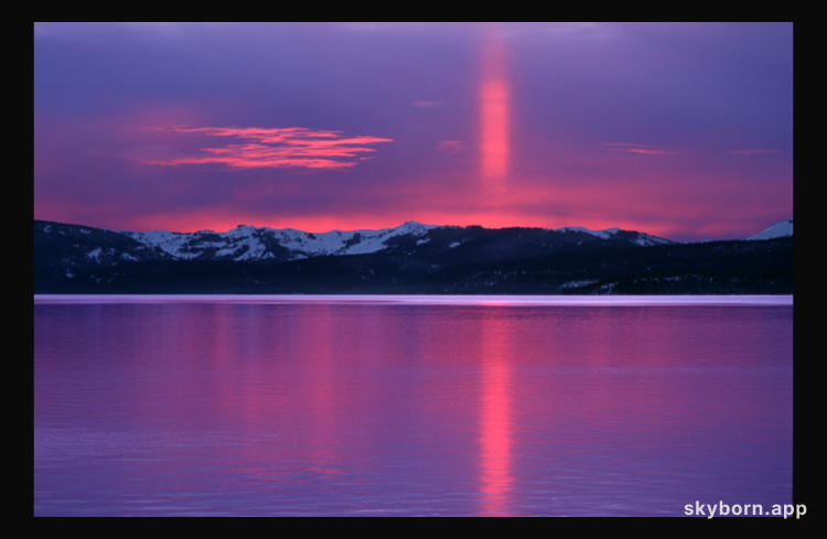 A Sun Pillar in Red and Violet