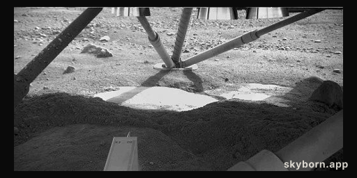 Unusual Light Patch Under Phoenix Lander on Mars