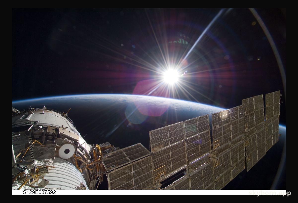 Bright Sun and Crescent Earth from the Space Station