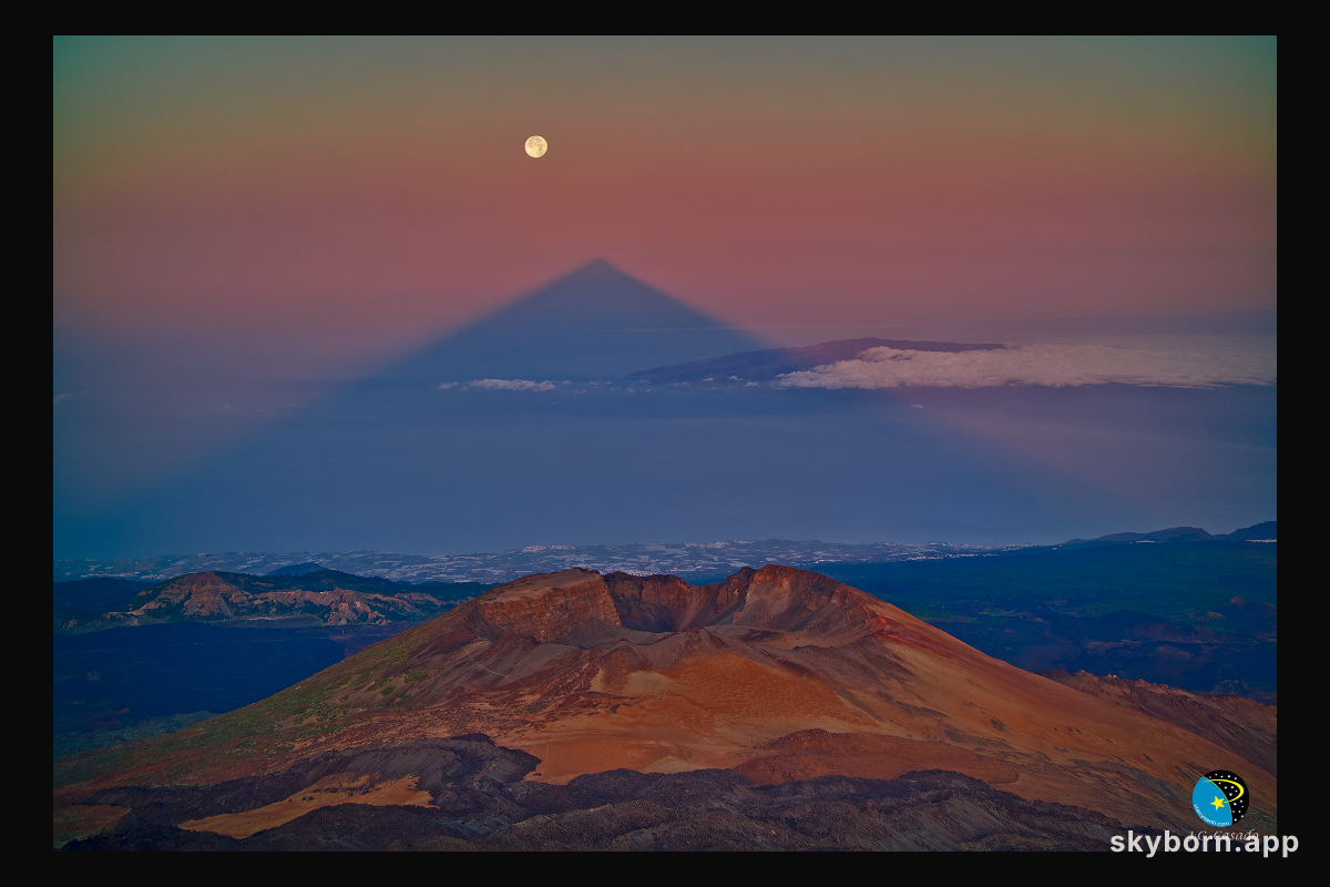 A Triangular Shadow of a Large Volcano