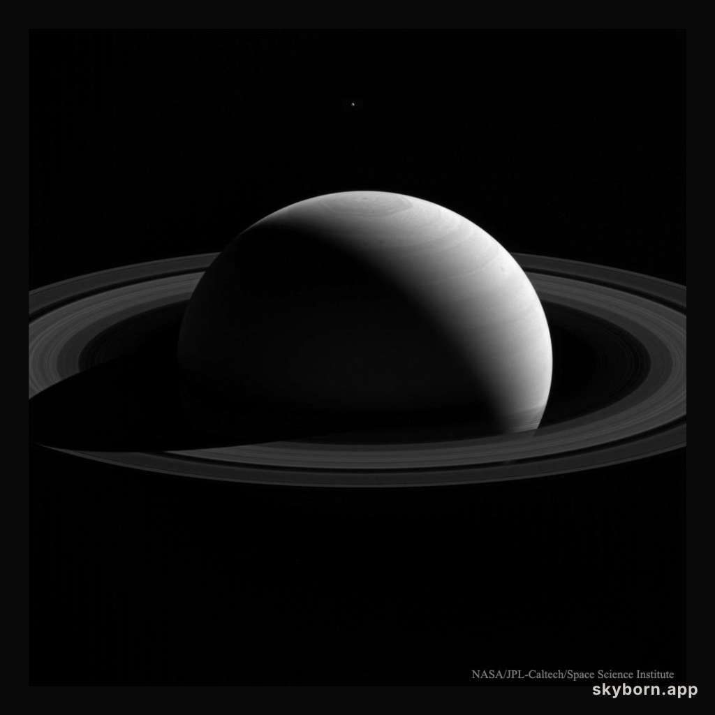 Behind Saturn