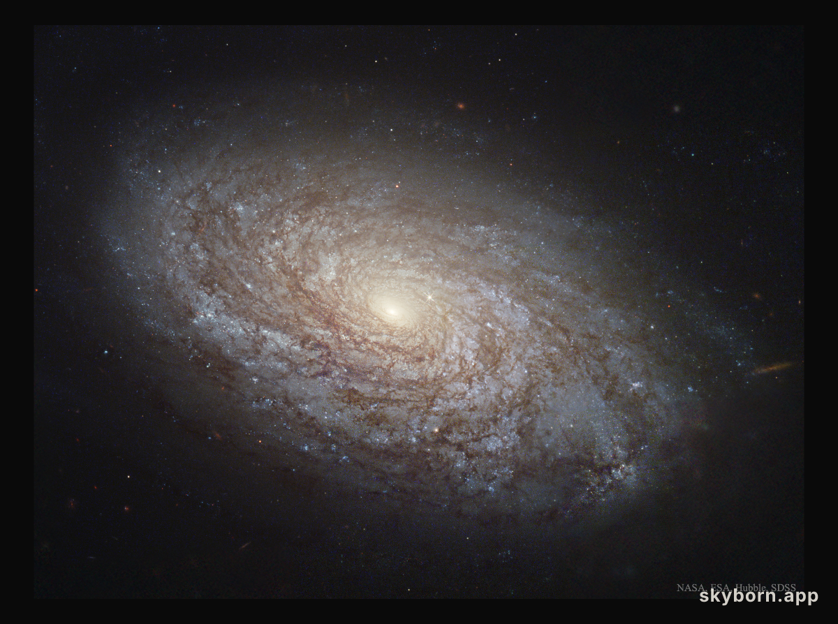 NGC 4414: A Flocculent Spiral Galaxy