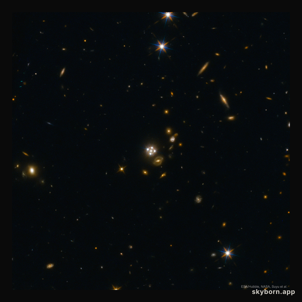 Four Quasar Images Surround a Galaxy Lens