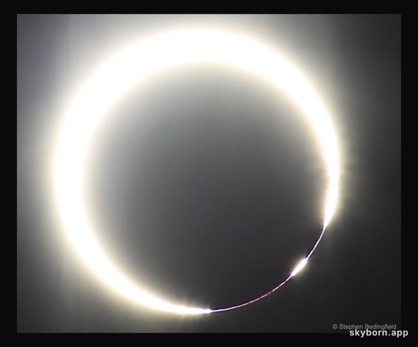 A Solar Eclipse with a Beaded Ring of Fire