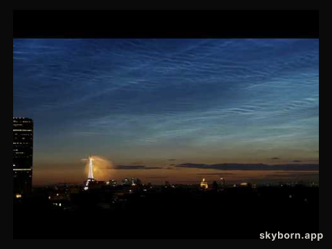 Noctilucent Clouds over Paris Fireworks
