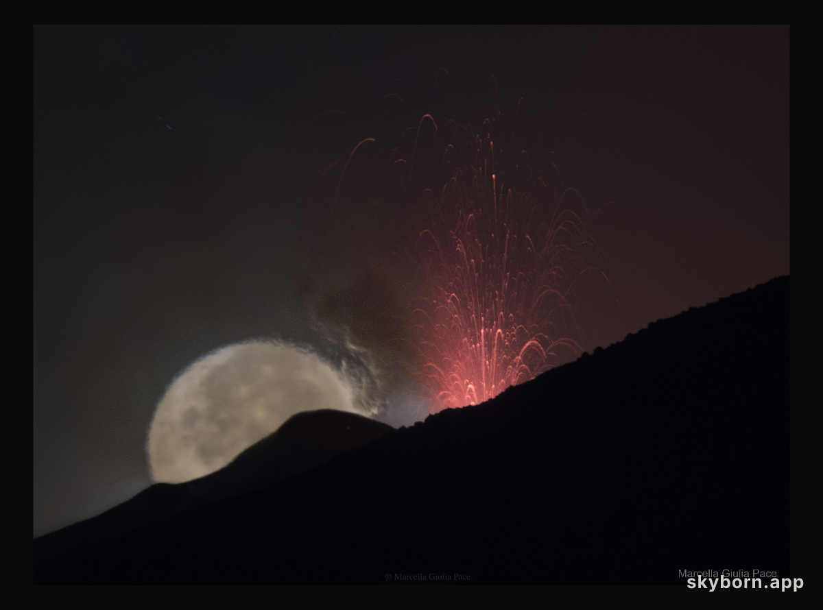 Moon behind Lava Fountain