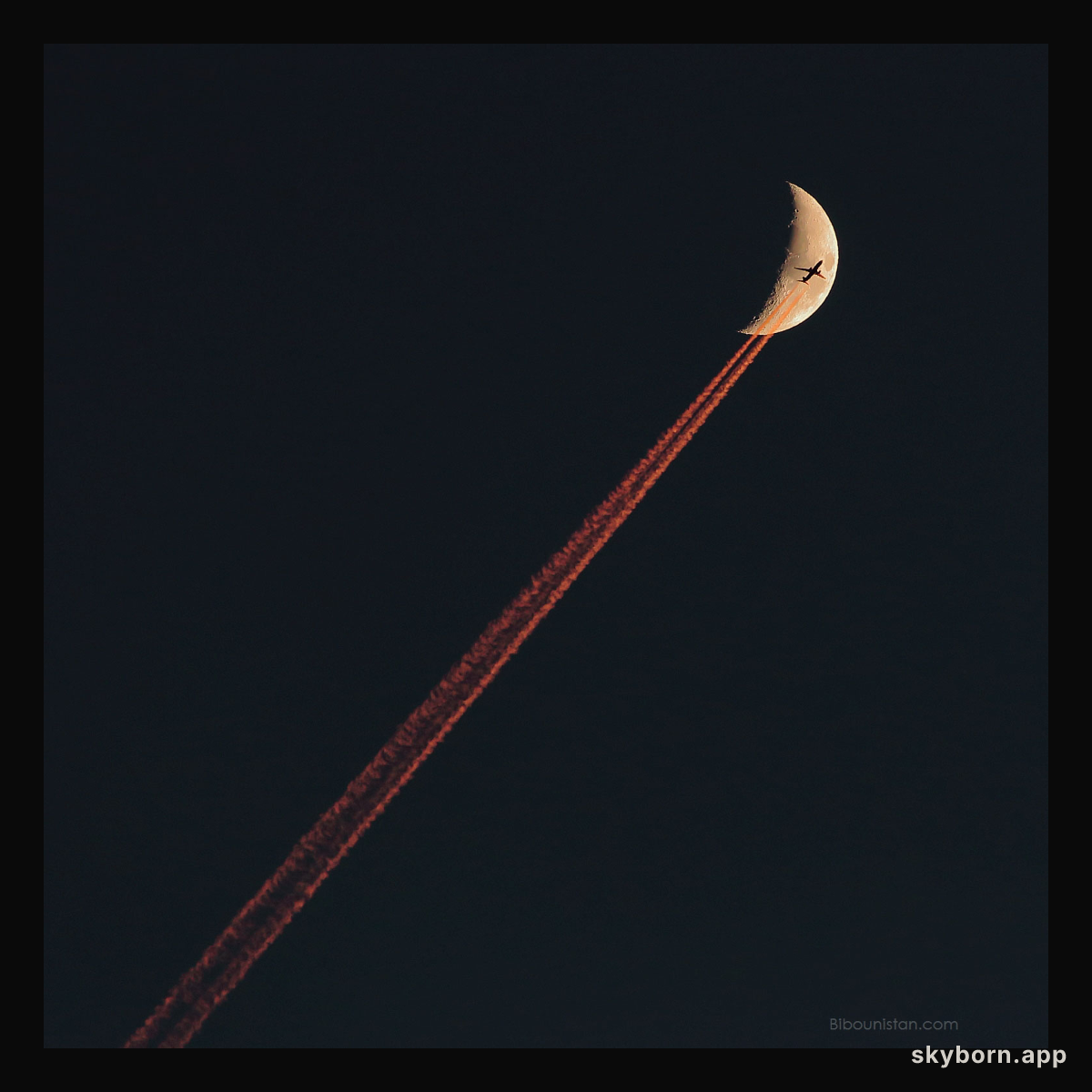 Plane Crossing a Crescent Moon