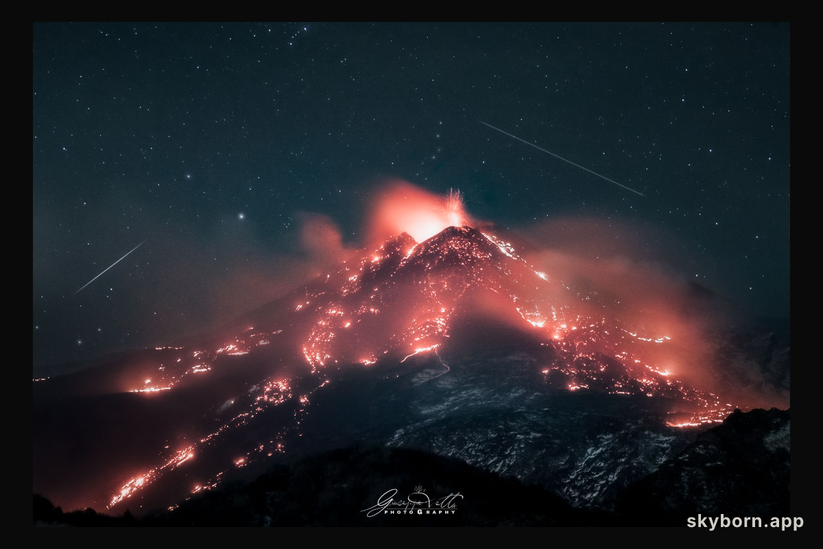 Stars over an Erupting Volcano