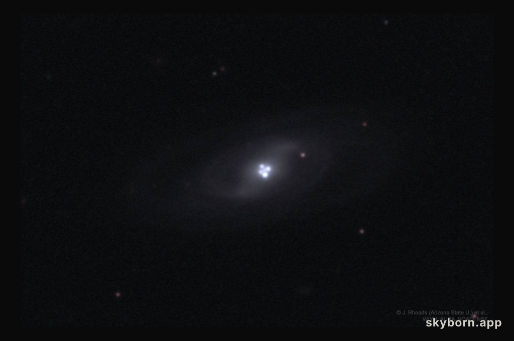 The Einstein Cross Gravitational Lens