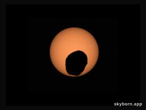A Martian Eclipse: Phobos Crosses the Sun