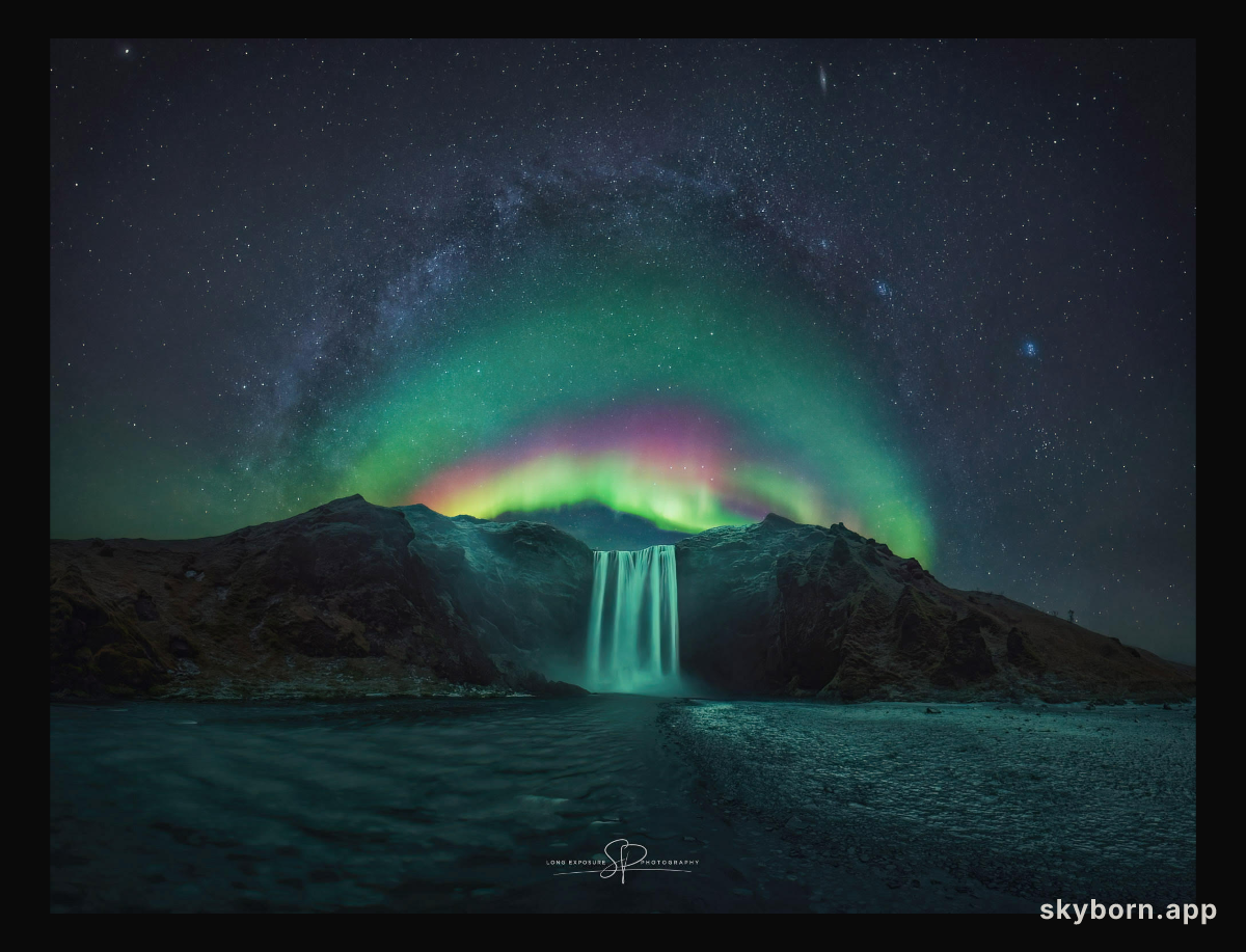 Rainbow Aurora over Icelandic Waterfall