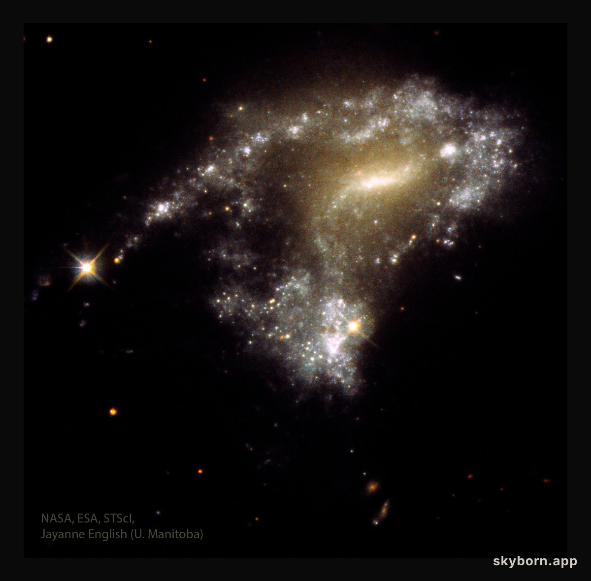 AM1054: Stars Form as Galaxies Collide