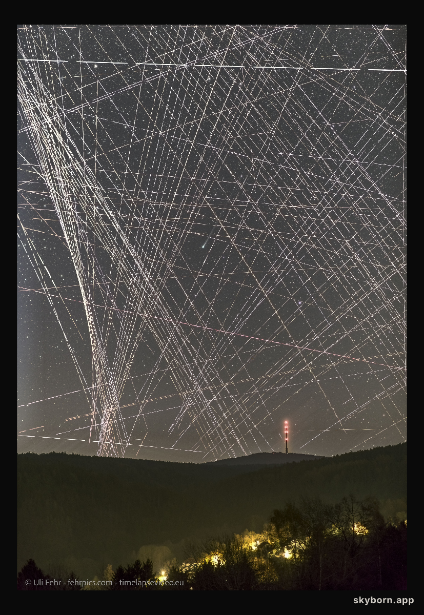 Comet R3 PanSTARRS Behind Satellite Trails