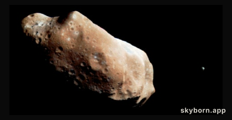 Ida and Dactyl: Asteroid and Moon