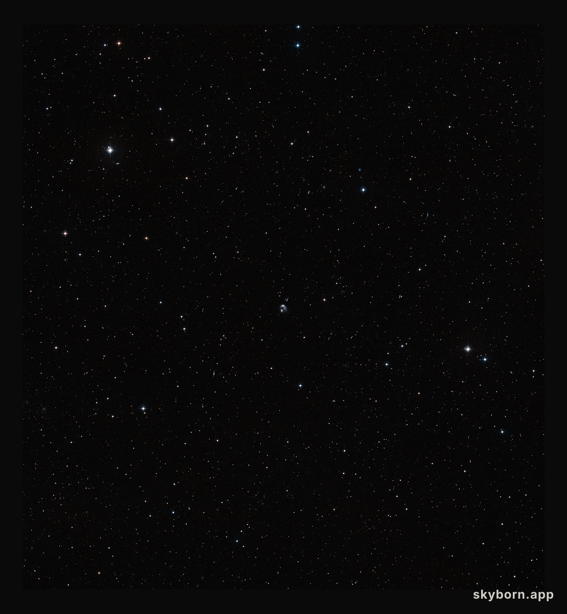 The area around merging galaxy duo Arp 142 (ground-based image)