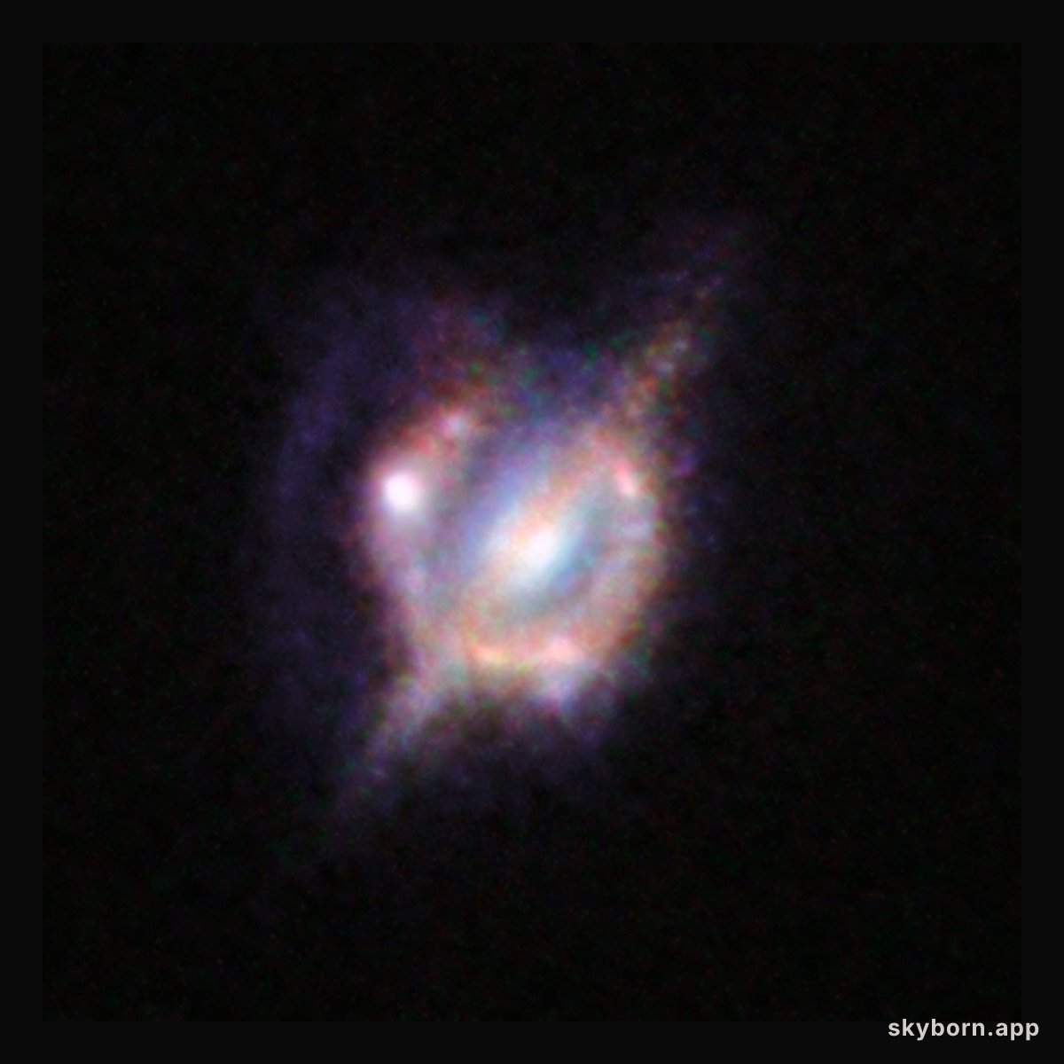 Merging galaxies in the distant Universe through a gravitational magnifying glass