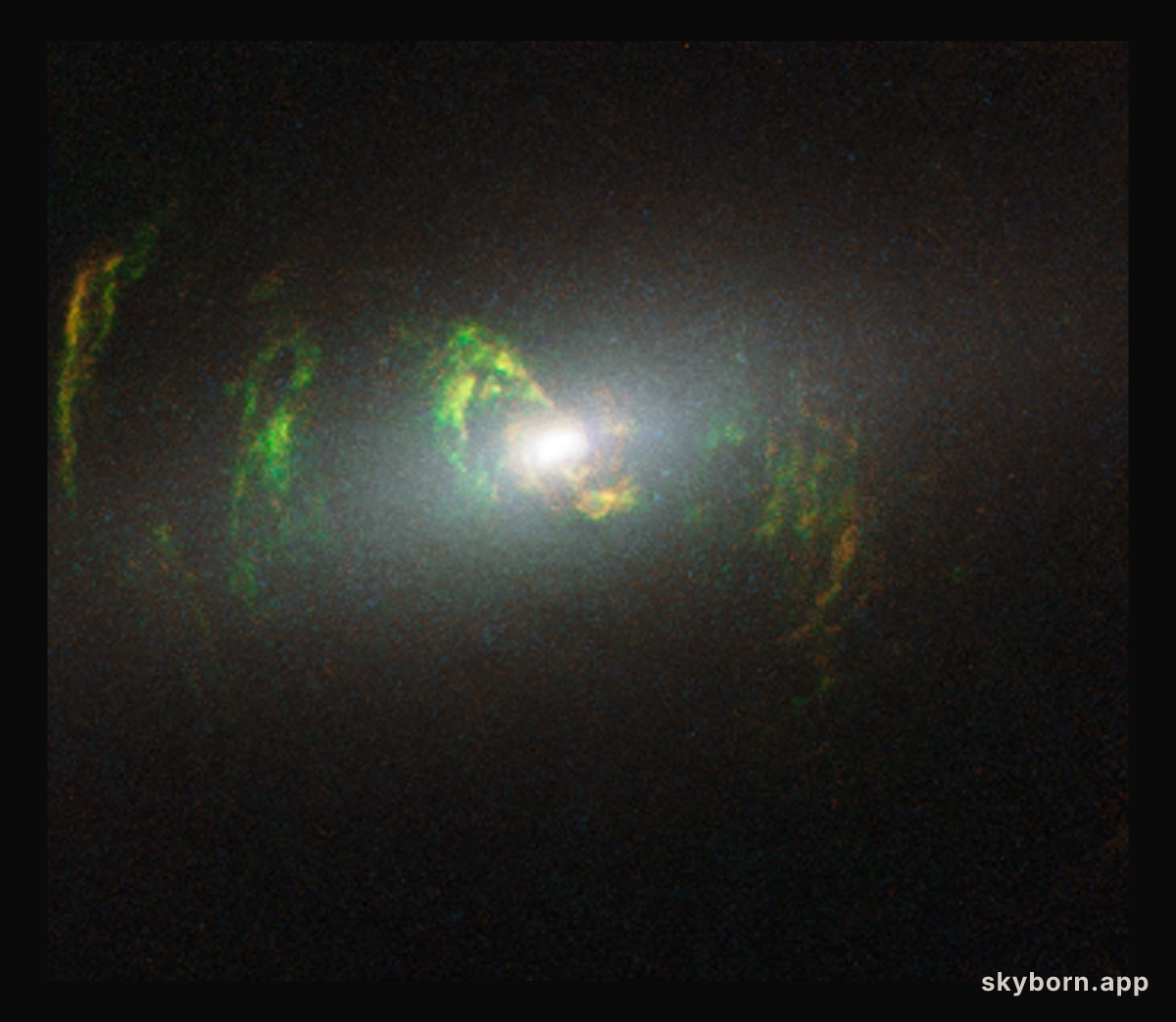 Hubble view of green filament in galaxy NGC 5252