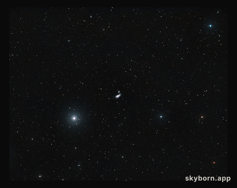 Distant view of a galactic crash: NGC 4490 and NGC 4485 (ground-based image)
