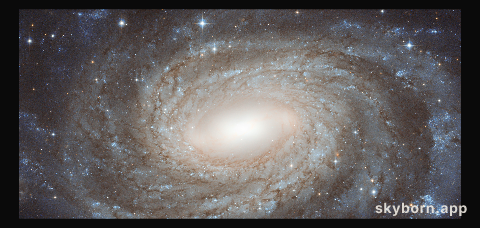 Perfect spiral overlaid with Milky Way gems
