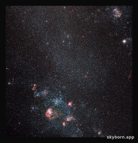 Faint galaxy with popping pink features
