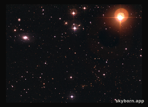Galaxy ESO 570-19 and variable star UW Crateris