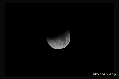 NASA photographer captures Super Blue Blood Moon beginning its eclipse January 31 from NASA's Armstrong Flight Research Center on the West Coast.