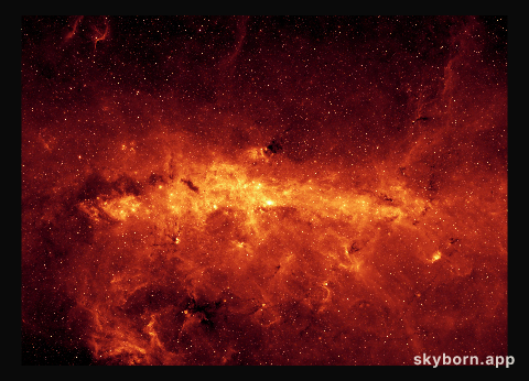 The Milky Way Center Aglow with Dust