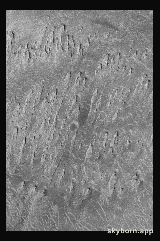 Wind Erosion in Tithonium