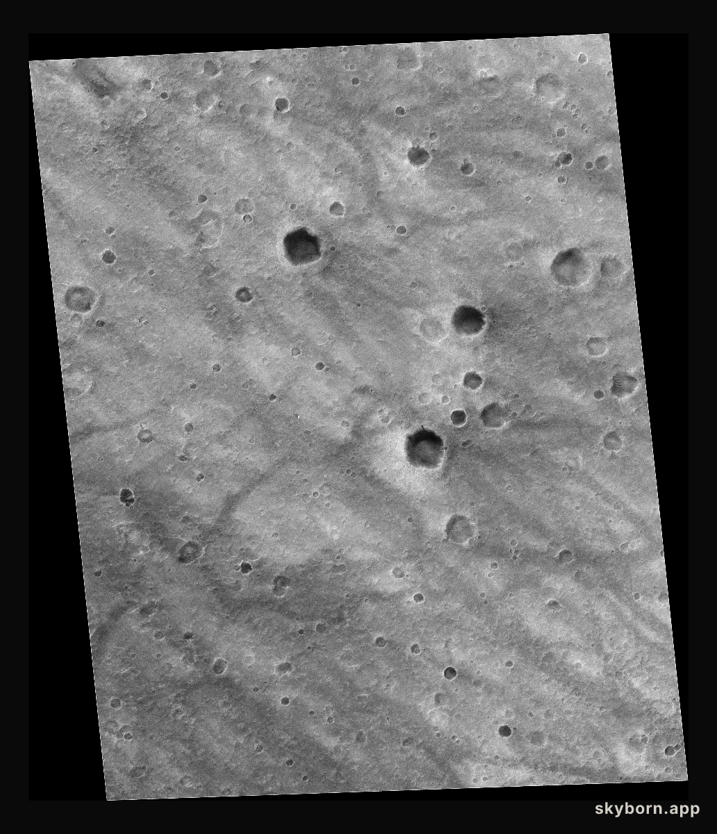 Rover Tracks Seen from Orbit