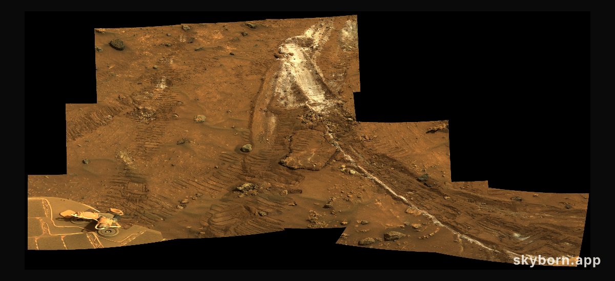 Rover Wheel Churns Up Bright Martian Soil