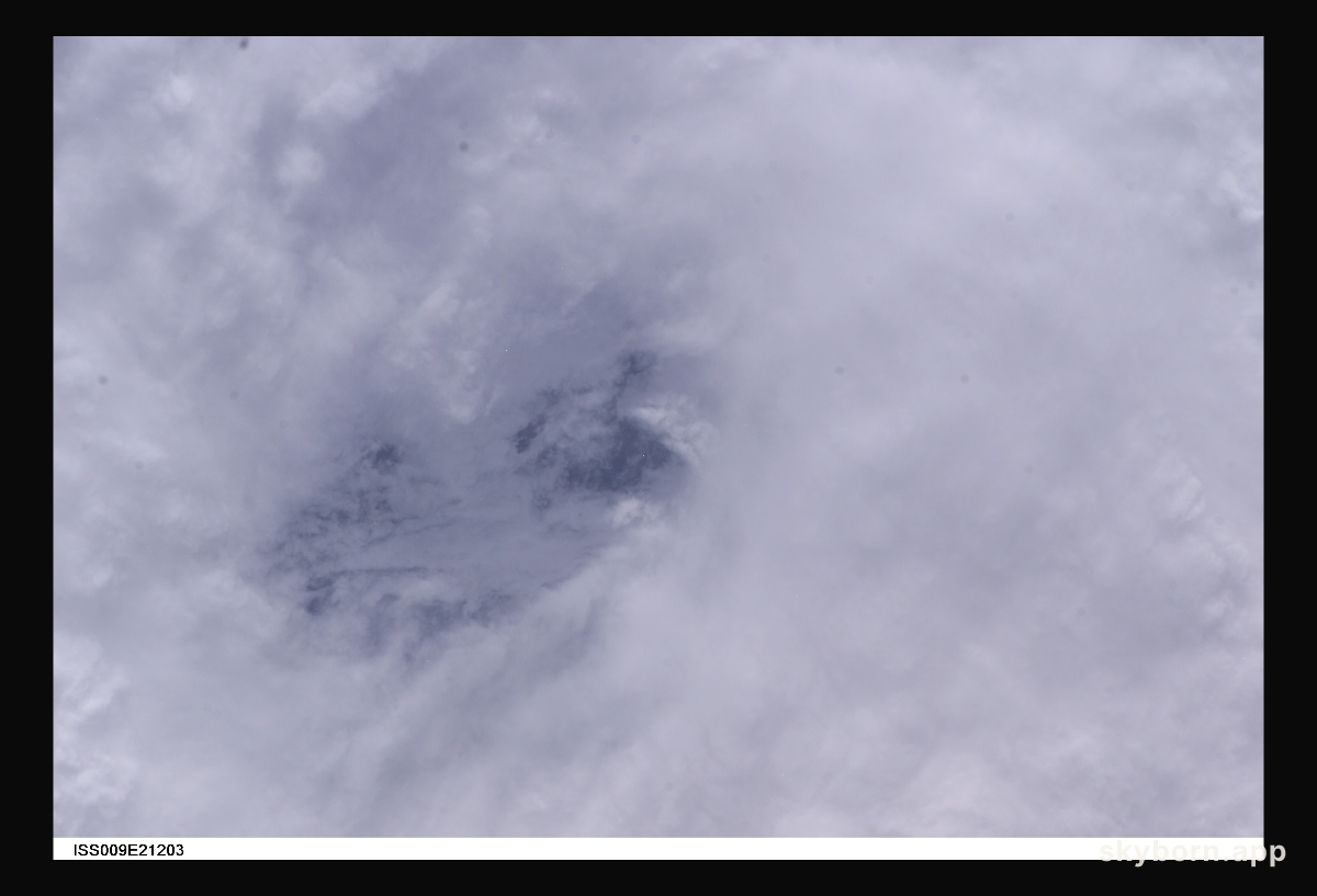 From 230 miles above, this is a view into the eye of Hurricane Frances as it churned in the Atlantic Ocean almost 500