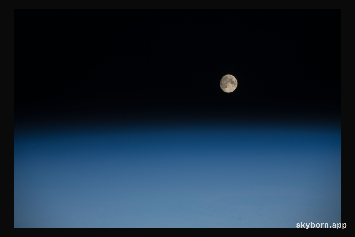 A waxing gibbous moon was pictured above the Earth's limb as the International Space Station orbited over the southern