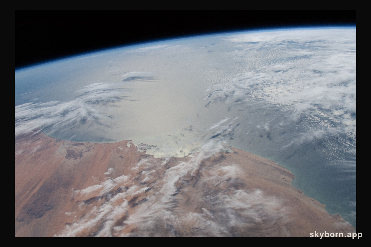 The Sun's glint radiates off the Atlantic Ocean
