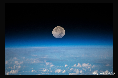 The full moon is pictured as the International Space Station orbited 254 miles above the Pacific Ocean northeast of Guam