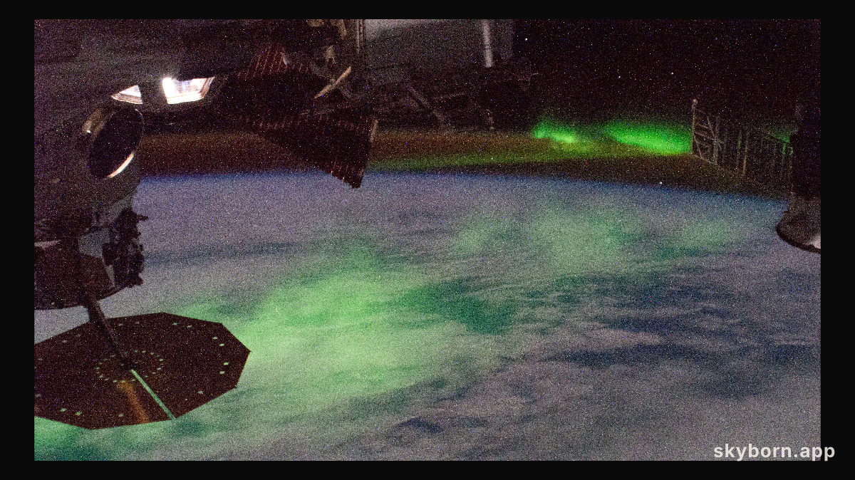 The "aurora australis" glows beneath the International Space Station as it nears the southern-most point of its orbital
