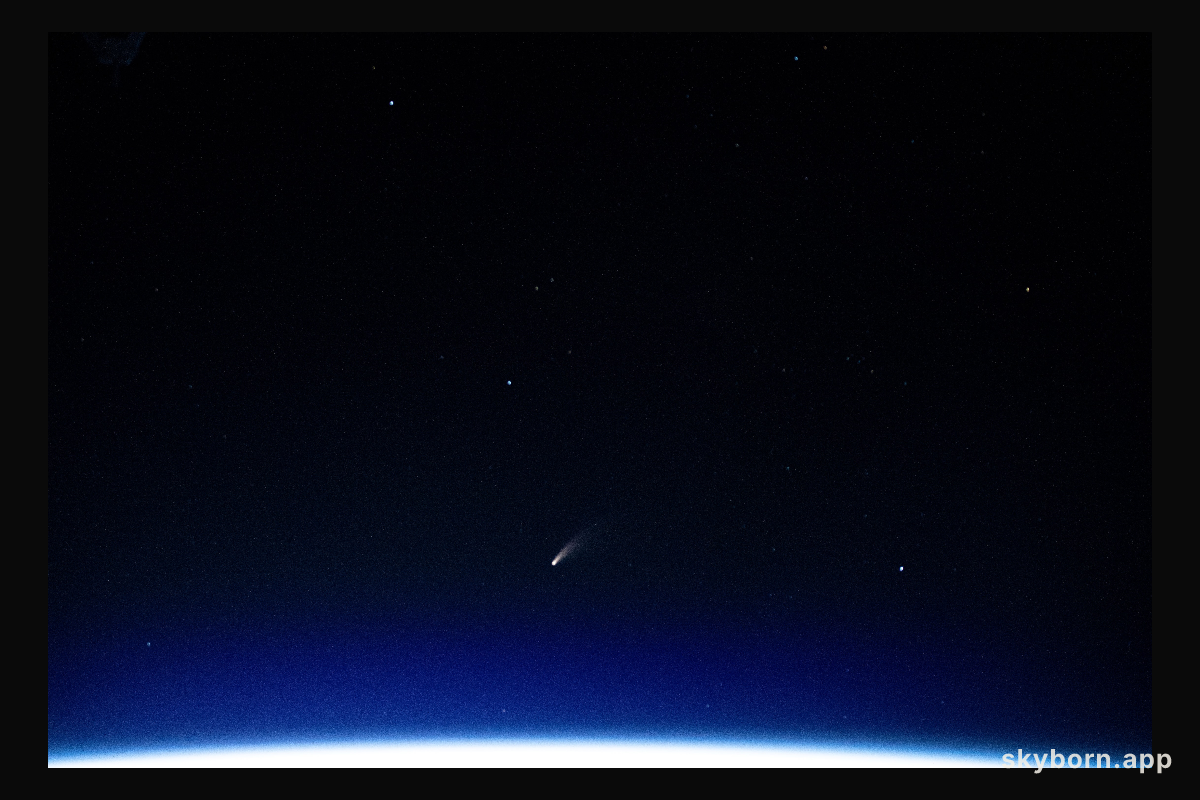 The tiny shooting star in the lower center of this image is Comet Neowise pictured from the International Space Station