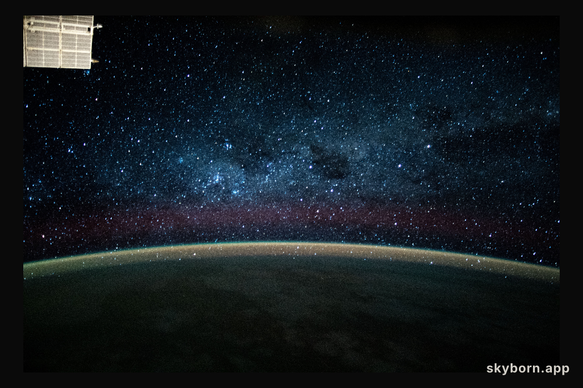 This long-exposure photograph during an orbital night period from the International Space Station reveals a wispy, but