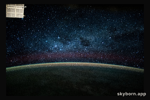 This long-exposure photograph during an orbital night period from the International Space Station reveals a wispy, but
