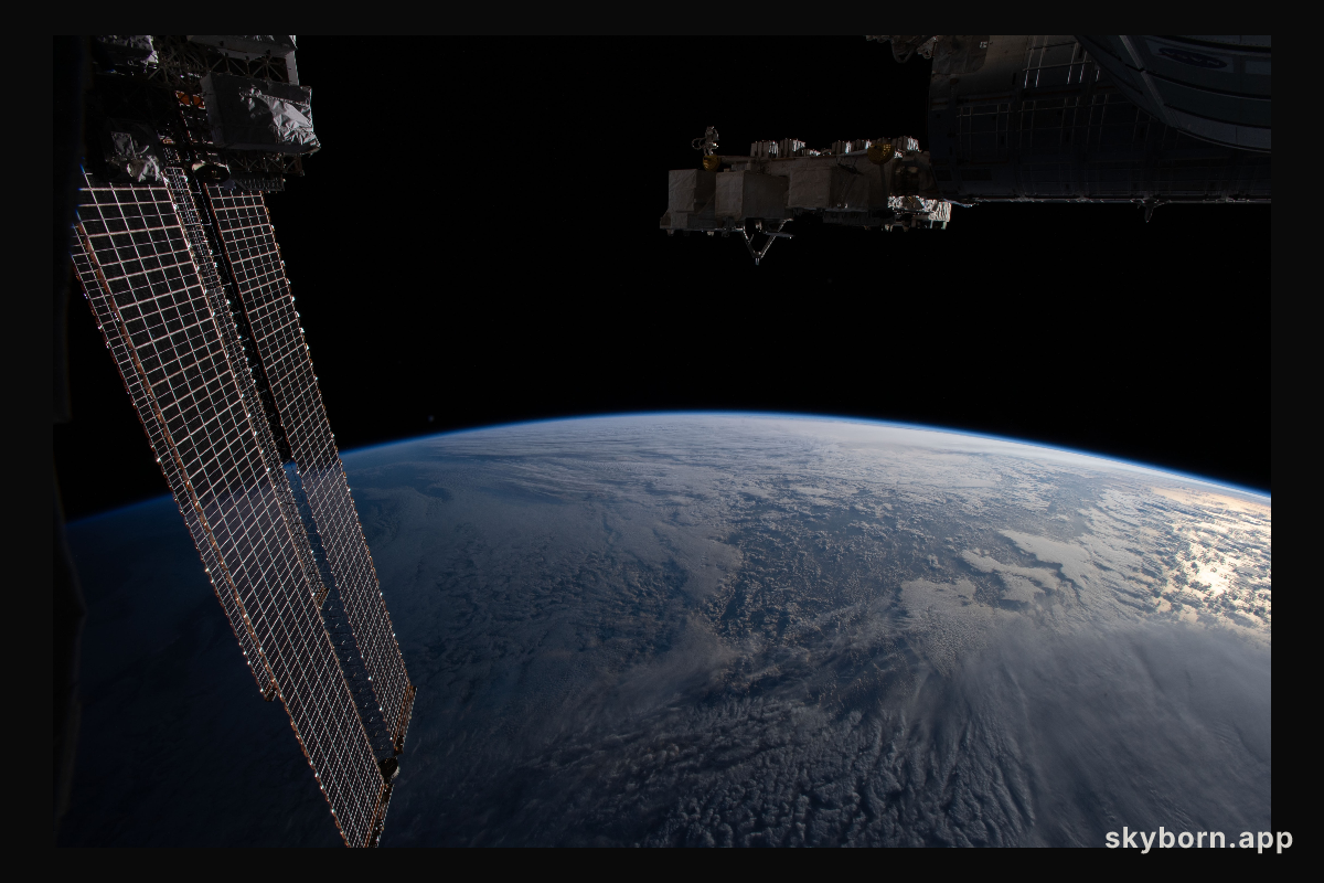 The Earth's limb, or horizon, is pictured as the International Space Station orbited above the north Pacific near