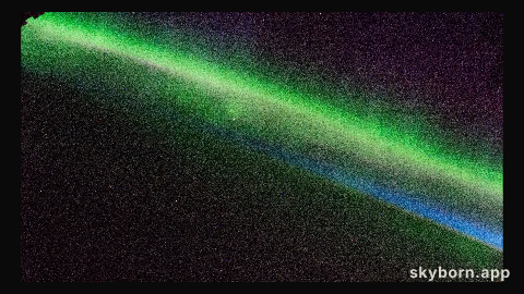 An aurora glows above the Earth's horizon as the International Space Station flew into an orbital sunset 270 miles