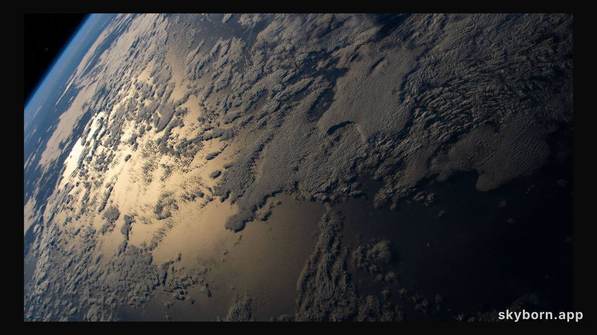 The sun's glint beams off the Indian Ocean as the International Space Station orbited 269 miles above south of Western